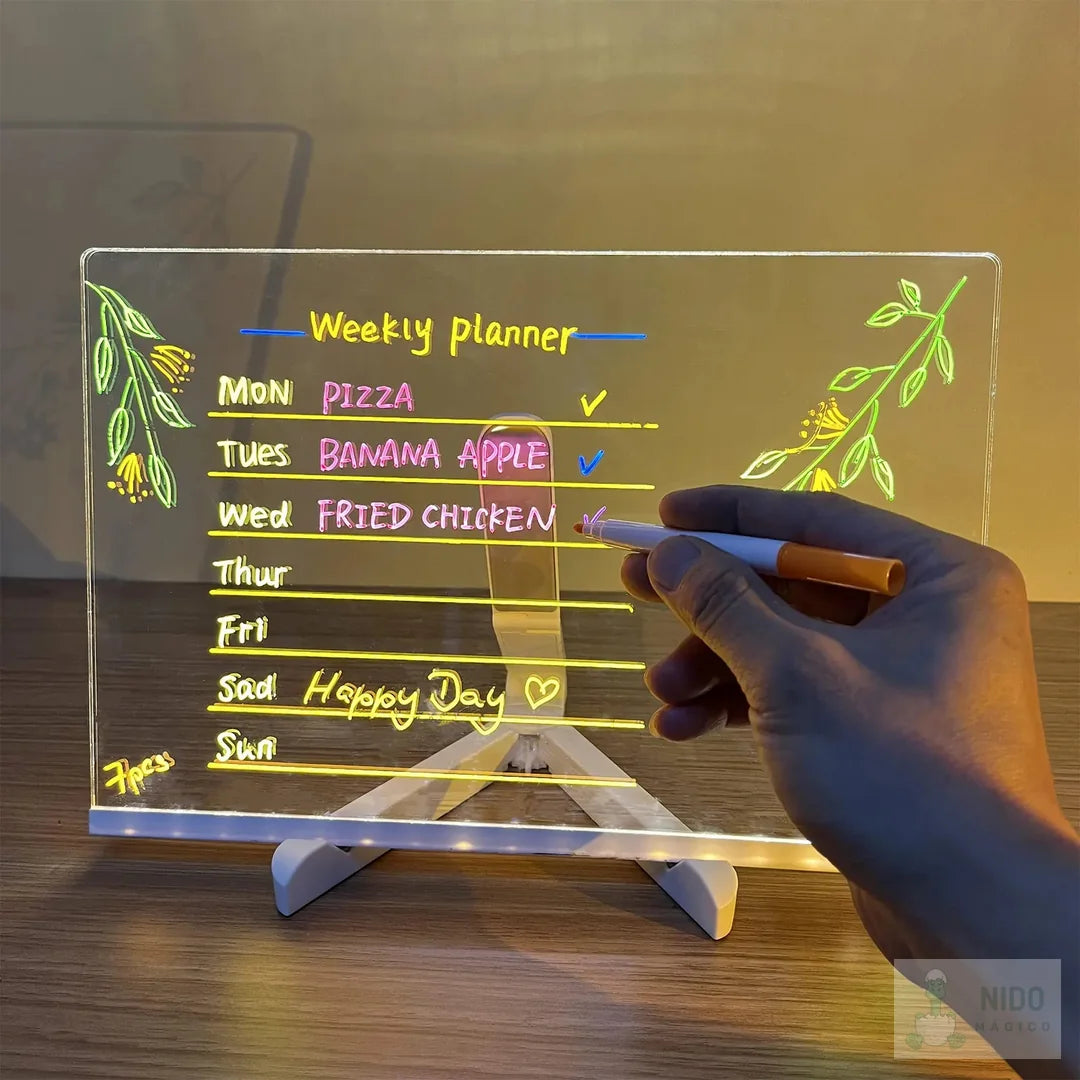 Tablero LED usado como agenda semanal con marcadores de colores